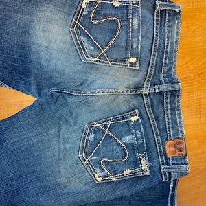 Women’s buckle jeans